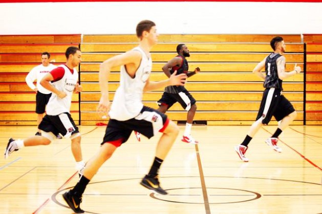 Basketball Players Running Sprints 