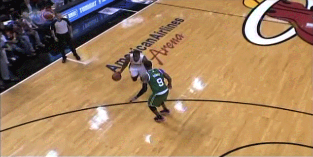 Boston Celtics PG Rajon Rondo commits flagrant foul on Miami Heat G Dwyane Wade.
