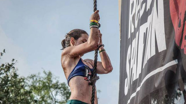 Climbing an obstacle at the Spartan Race