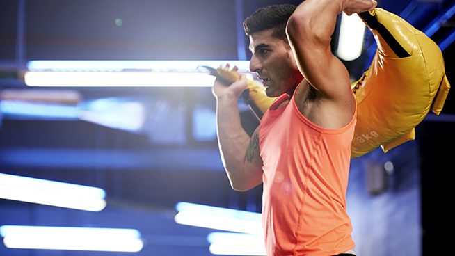 Outdoor sales sandbag workout