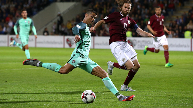 During the game, a soccer player kicked the ball