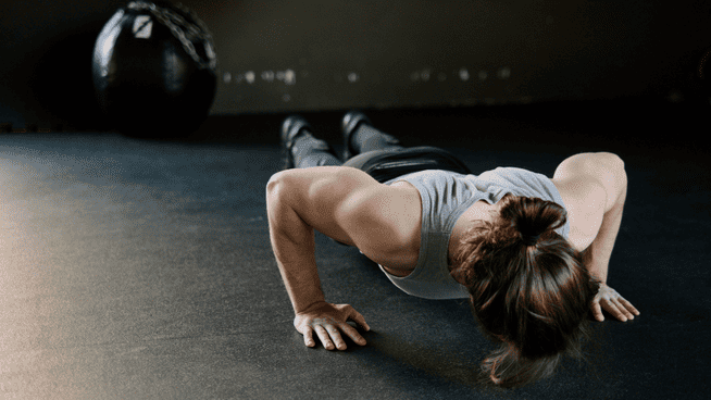 woman performing push up