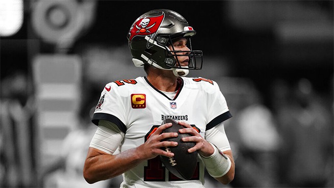 Tampa Bay Buccaneers quarterback Tom Brady (12) works in the pocket against the Atlanta Falcons during the second half of an NFL football game, Sunday, Dec. 5, 2021, in Atlanta. (AP Photo/John Bazemore)