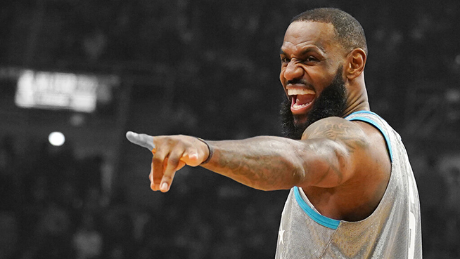 Los Angeles Lakers' LeBron James jokes with fans during the NBA All-Star game in Cleveland, Sunday, Feb. 20, 2022. (AP Photo/Charles Krupa)