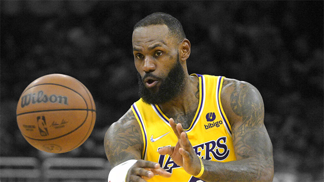 Los Angeles Lakers forward LeBron James (6) passes a ball during the first half of an NBA basketball game against the Orlando Magic, Friday, Jan. 21, 2022, in Orlando, Fla. (AP Photo/Phelan M. Ebenhack)