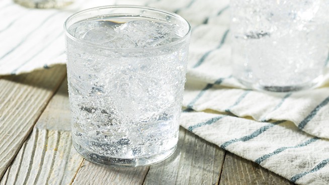 Fresh Spring Sparkling Water with Ice in a Glass