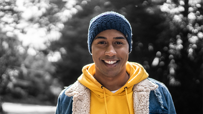 Portrait of a young man in a trail