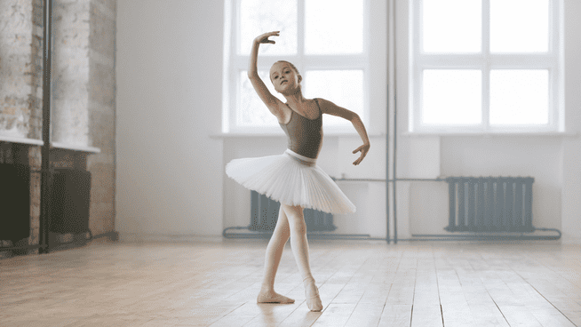 young female dancer ballerina in the studio - strength training for young dancers