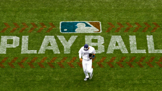 major league baseball logo and words "play ball" on mlb field - rule changes in mlb