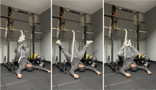 inversion training man performing inversion training upside down at gym