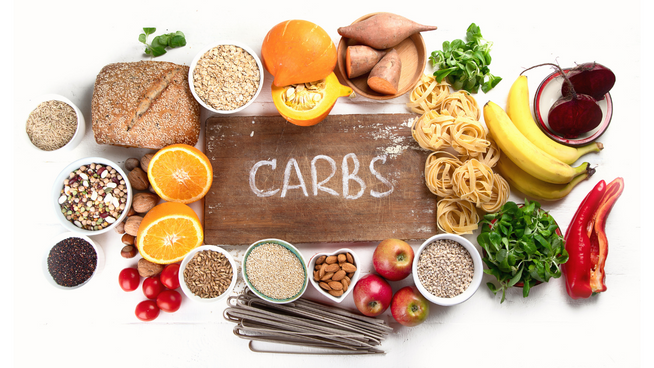 a whole table of foods high in carbs or carbohydrates