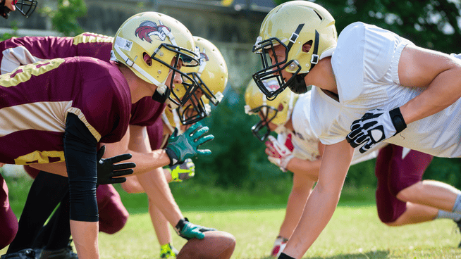 high school football linemen about to go head to head