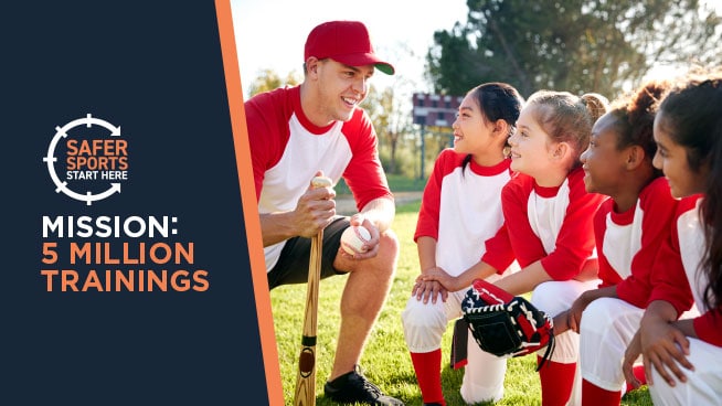 youth softball coach talking with youth softball female athletes