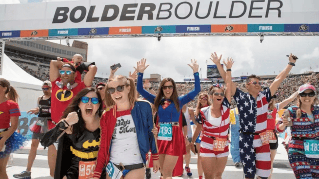 BolderBoulder race runners celebrating at race in Boulder, Colorado