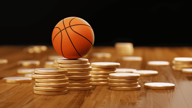 graphic image of basketball sitting on gold coin for nil deal article
