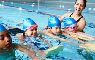 image of young female children in swimming lessons